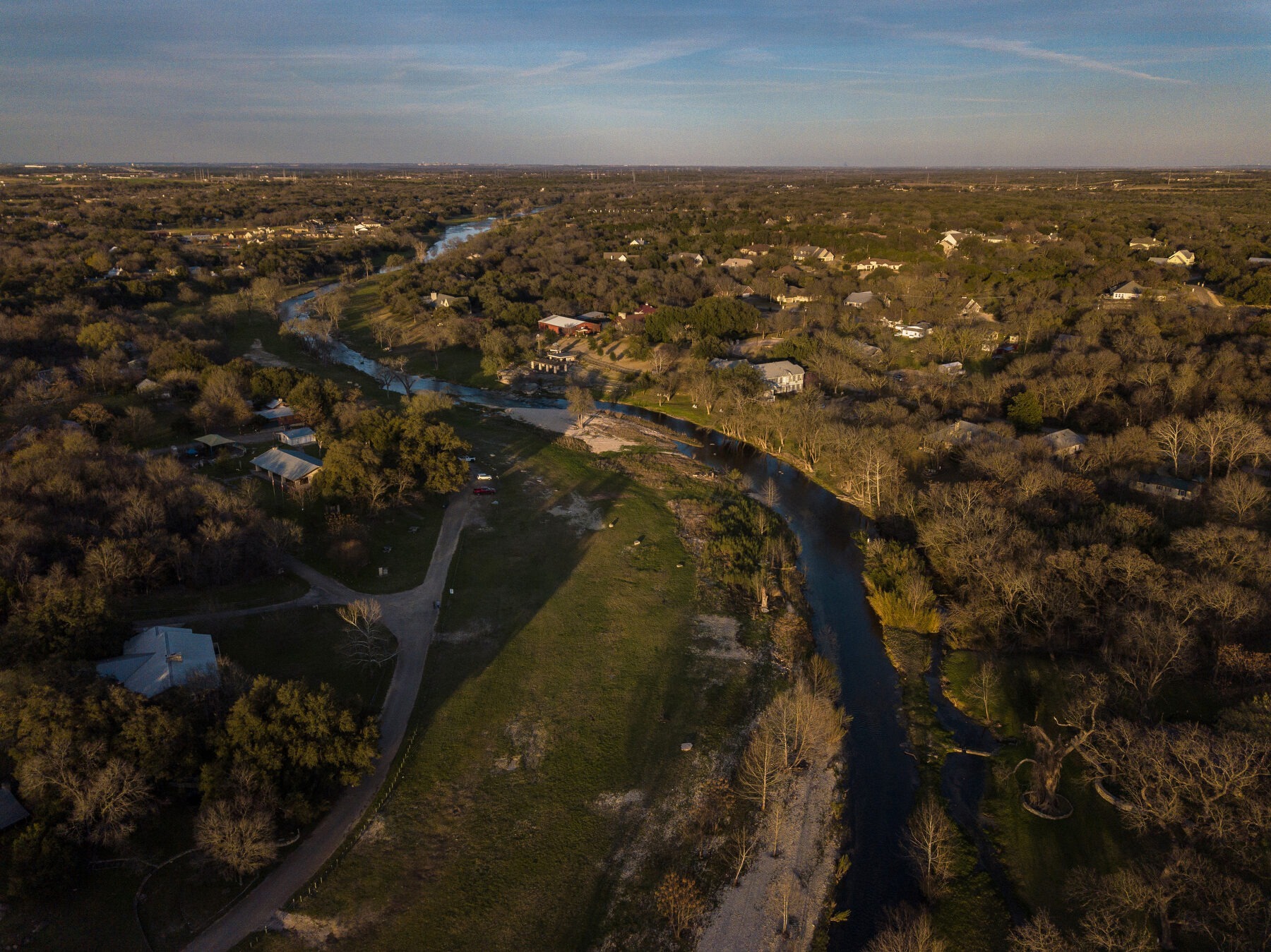 aerial view of river or creek at sunset